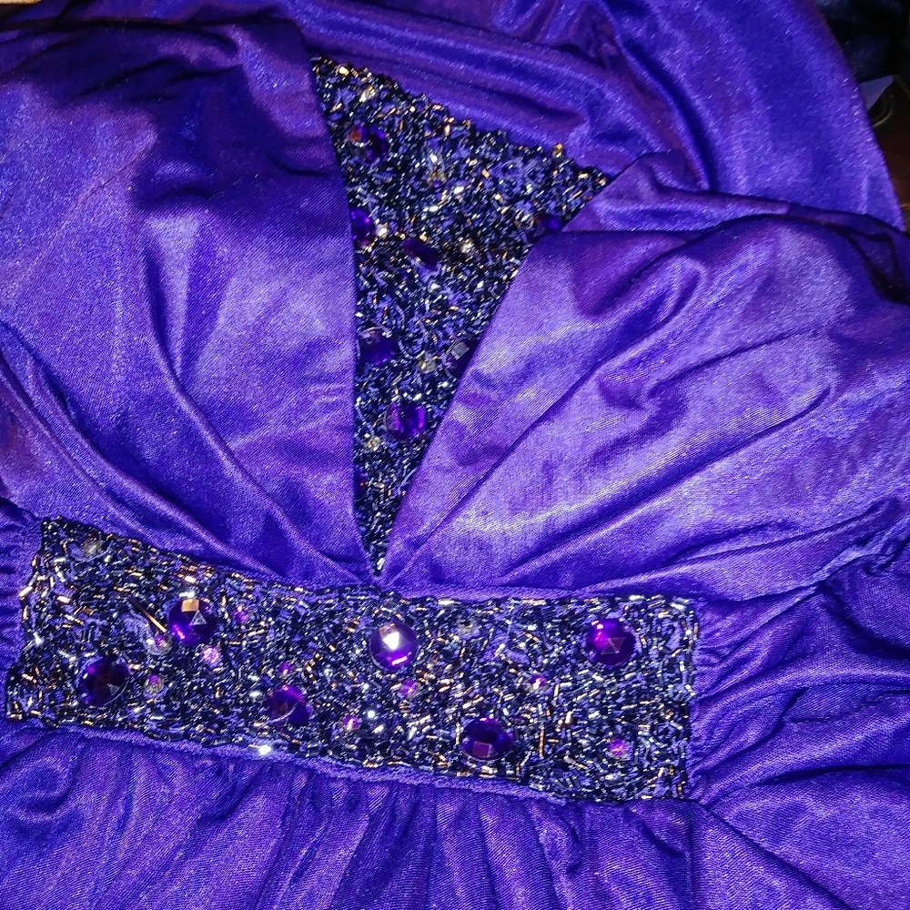 Dress color is purple...not blue